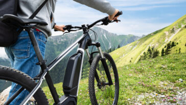 Main On Mountain With His Bike
