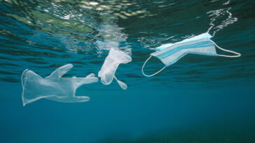 Plastic waste underwater gloves with face mask
