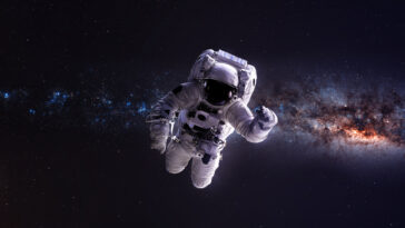 Astronaut in outer space. Elements of this image furnished by NASA.