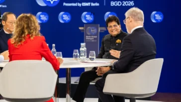 Piyush Goyal, India's Union Minister of Commerce and Industry, speaking at a circular panel table on stage at the Berlin Global Dialogue 2026 in Berlin